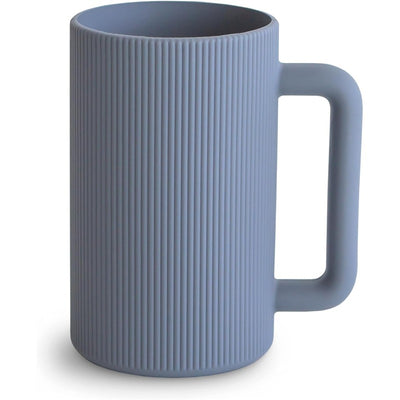 Mushie Bath Rinse Cup in Tradewinds, featuring a textured ribbed design, sturdy handle, and soft blue color for bath time.