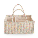 Mushie Baby Diaper Caddy in Pastel Blooms, featuring floral design and multiple compartments for organizing newborn essentials.