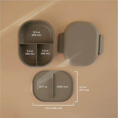 Mushie Bento Lunch Box in sage color, featuring three sections with various capacities labeled in ounces and milliliters.