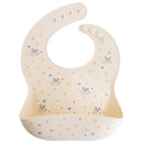 Silicone baby bib in ivory with colorful patterns of flowers and cartoon characters, designed to catch spills during mealtime.