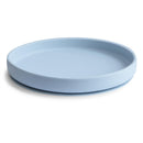 Classic silicone suction plate in powder blue, designed for children, featuring a gentle curved edge for safety.