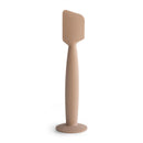 Mushie silicone diaper cream applicator in a neutral tone, designed for easy and hygienic application of diaper cream.