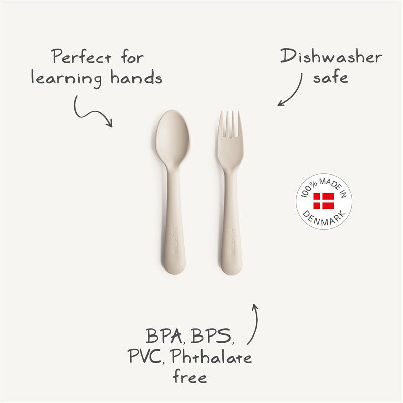 Mushie Silicone Dinnerware Fork and Spoon Set in sage color; features text about safety and usability for children.