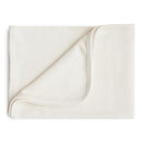 Mushie Extra Soft Baby Blanket in ivory color, featuring a smooth fabric with a folded corner showcasing its soft texture.
