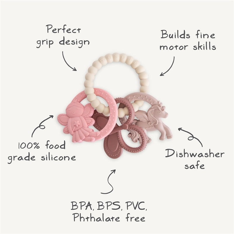 Mushie Fairy Teething Ring made of 100% food-grade silicone, featuring a fairy and unicorn design, dishwasher safe, and BPA-free.