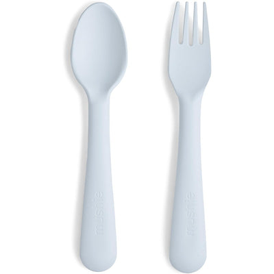 Silicone fork and spoon set in powder blue, featuring soft, curved handles and a smooth finish for easy grips.