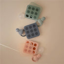 Mushie Fresh Food Feeder Freezer Tray in Tradewinds colors, featuring gray and mint trays with silicone feeding caps.