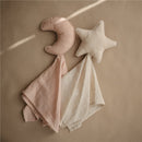 Mushie Moon Lovey in blush featuring a pink crescent moon and a neutral star attached to soft, light-colored fabric.