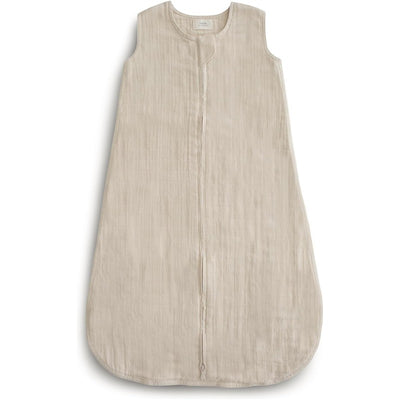 Mushie Muslin Sleep Bag in Fog, featuring a soft, neutral color and a front zipper for easy dressing.