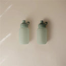 Mushie Puree Pouch in Cambridge Blue, featuring two soft, reusable pouches with green caps and loops.