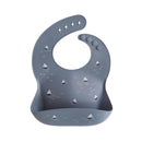 Silicone baby bib in gray featuring a boat design, designed to catch food spills and protect clothing.