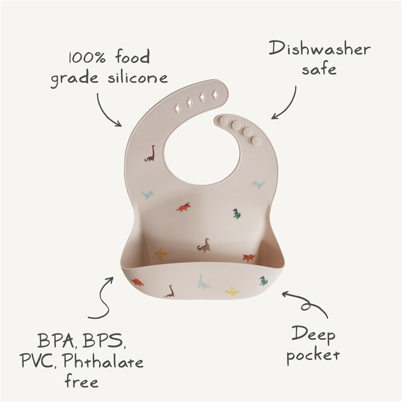 Silicone baby bib featuring a playful boat design, made of food-grade silicone and dishwasher safe, with a deep pocket.