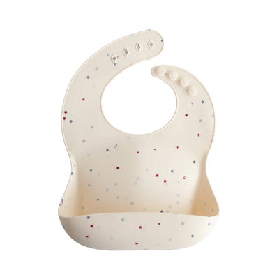 Silicone baby bib with a star pattern, designed for feeding, featuring a catch pocket and adjustable neck closure.