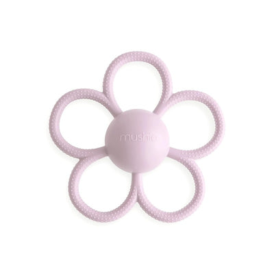 Soft lilac Mushie Daisy Rattle Teether featuring a flower design with textured surfaces for sensory play.