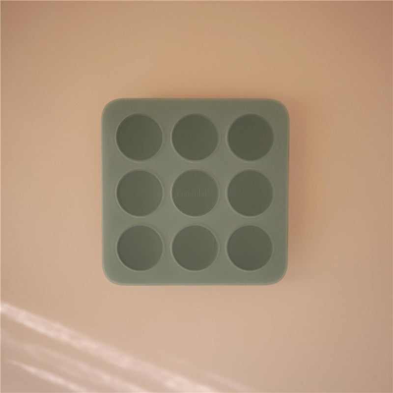 Mushie Baby Food Freezer Tray in Cambridge Blue, featuring nine circular compartments for easy portioning.