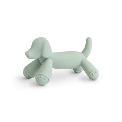 Soft green dog figurine teether with rounded features and textured paws, designed for infants to chew and play with.