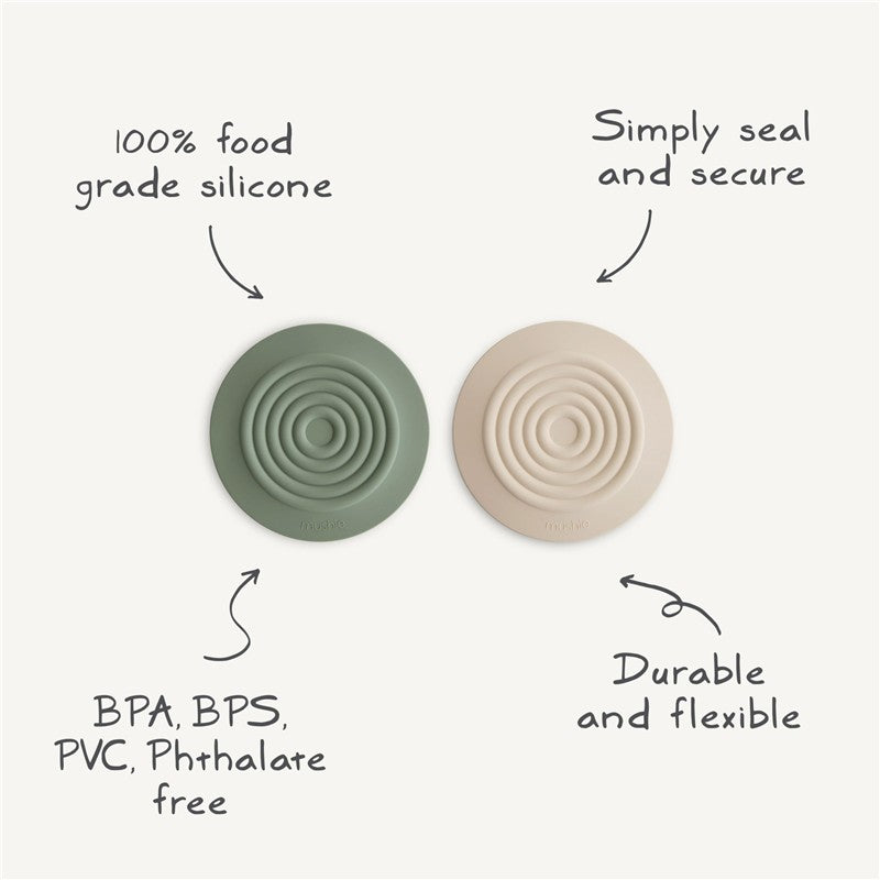 Silicone drain stoppers in blush and shifting sand colors, made from food-grade silicone, BPA-free, durable, and flexible.