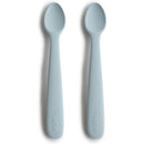 Silicone feeding spoons in powder blue, two-pack, designed for safe feeding of infants.