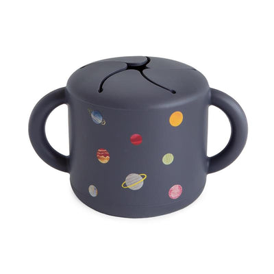 Silicone snack cup featuring a dark gray color with colorful planet designs, ideal for toddlers.