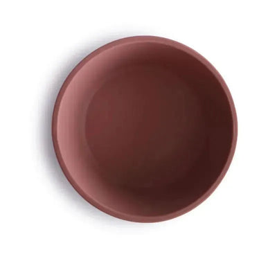 Silicone suction bowl in a woodchuck color with a smooth, round design, ideal for children’s meals.