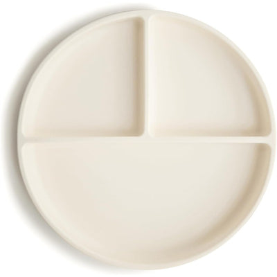 Silicone suction plate in ivory color, featuring three divided sections for serving food.