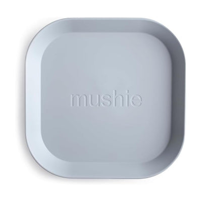 Mushie Silicone Square Plate in Cloud color, featuring rounded corners and embossed brand name.