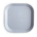 Mushie Silicone Square Plate in Cloud color, featuring rounded corners and embossed brand name.