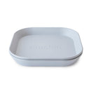 Mushie Silicone Square Plate Dinnerware Set in Cloud color, featuring a minimalist design with rounded edges and embossed branding.