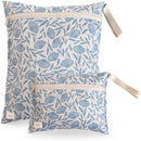 Mushie water-resistant wet bags in blue flower design, including one large and one small bag with zippers.