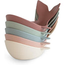 Mushie Whale Bath Stackers in soft pastel colors, designed for stacking, play, and water fun.