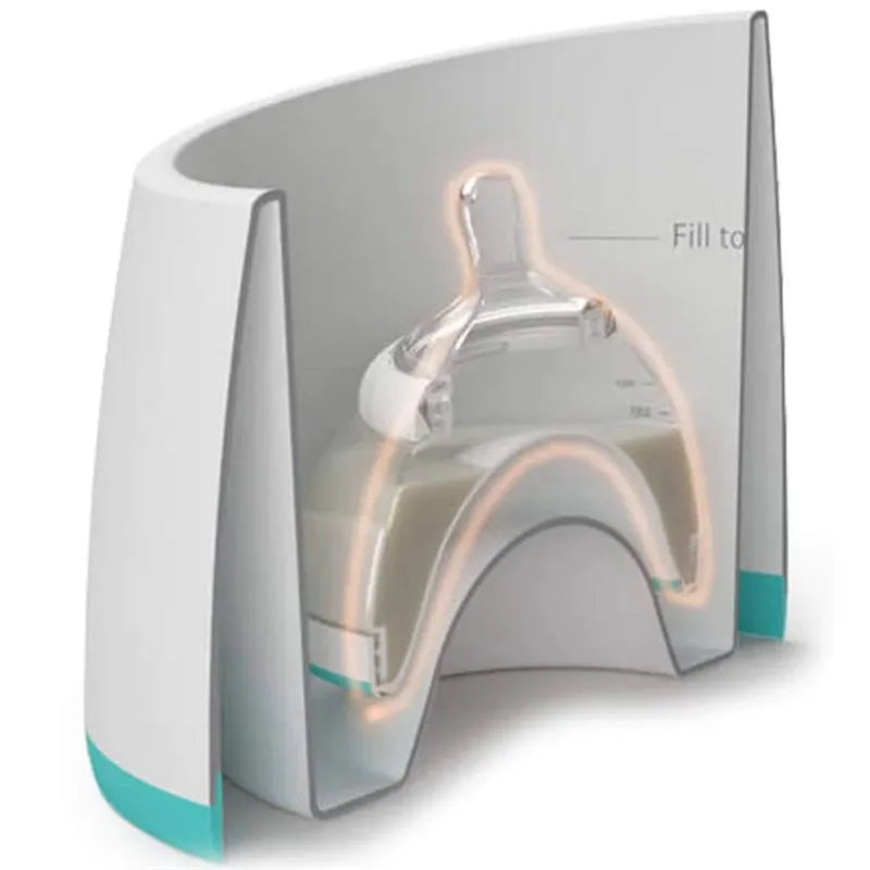 Breastmilk bottle warming bowl in teal with a bottle inside, showcasing a fill line for warming breastmilk.