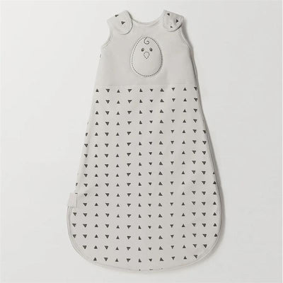 Grey sleeping sack with black triangular patterns and a bird design, labeled Nested Bean Zen Sack Classic Tog 0.5.
