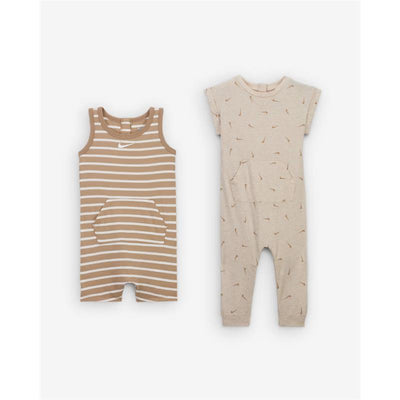 Two Nike short sleeve rompers for children: one with brown and white stripes, the other in beige with a subtle pattern.