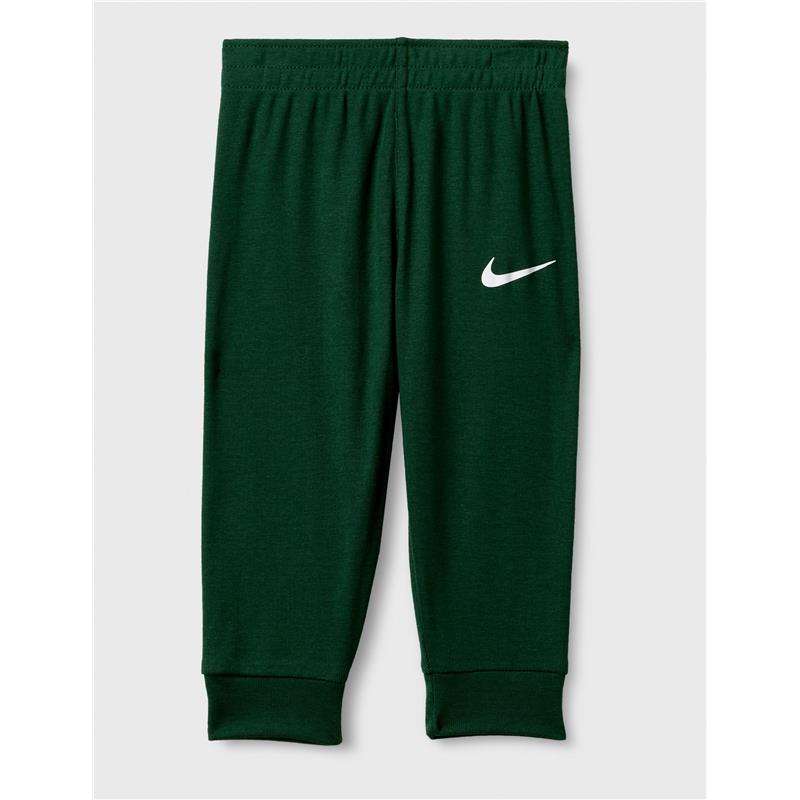 Green Nike pants featuring a white Nike logo, designed for comfort and active wear.