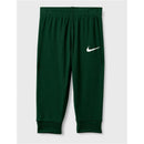 Green Nike pants featuring a white Nike logo, designed for comfort and active wear.