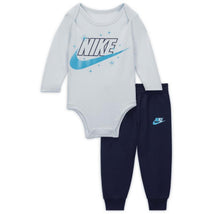 Nike Baby 2Pk Icon Cotton Bodysuit features a light blue long-sleeve bodysuit with a large logo and navy joggers.