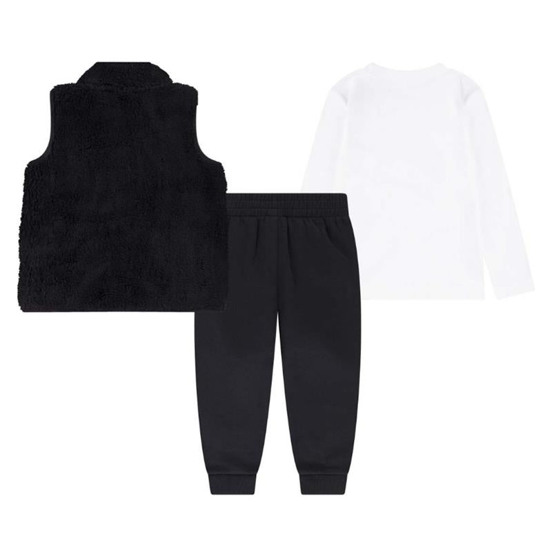 Nike Baby Club set featuring a black fuzzy vest, a white long sleeve t-shirt, and black jogger pants.
