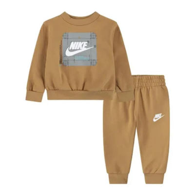 Nike baby set featuring a tan hoodie with a large Nike logo and matching pants, both designed for comfort.
