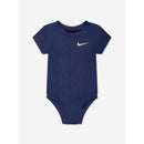 Navy Nike baby bodysuit with short sleeves and logo on the chest, designed for comfort and mobility.