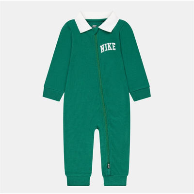 Baby sportswear coverall in malachite green, featuring a white polo collar and NIKE logo. Zipper closure and long sleeves.