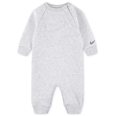 Nike Kids Coverall in Birch Heather, featuring a quilted texture, button placket, and logo detail on the sleeve.
