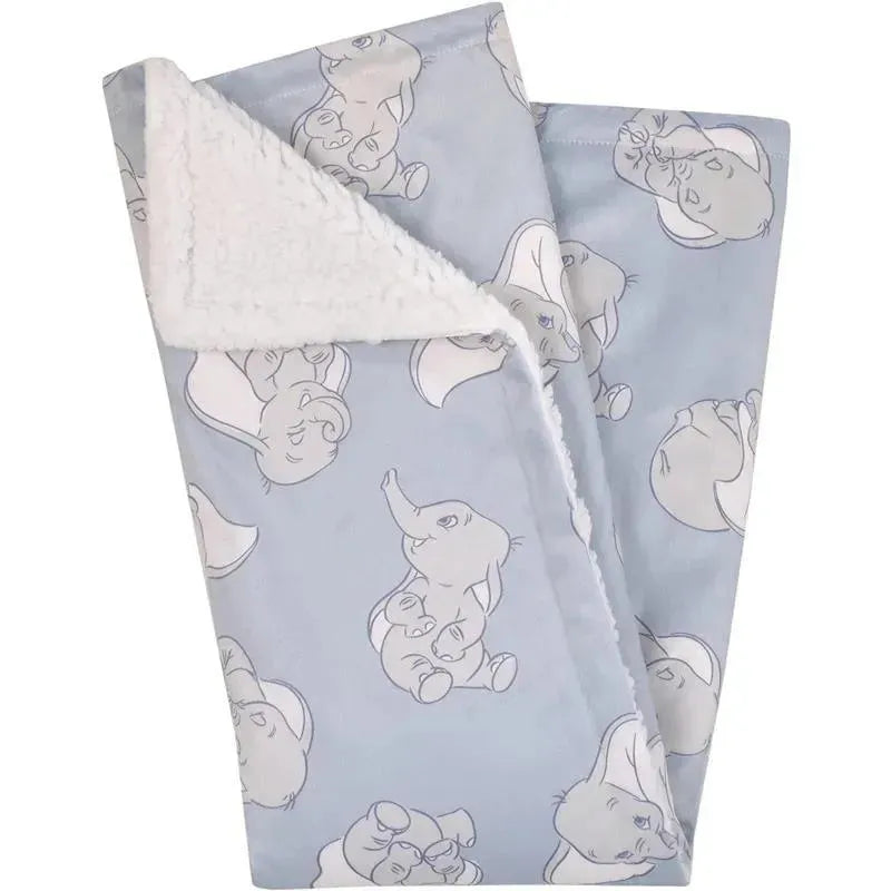 Soft sherpa baby blanket featuring Dumbo characters on a light blue background, ideal for infants.