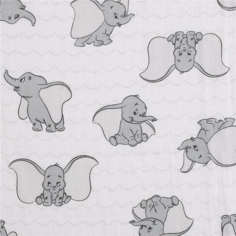 Printed muslin swaddles featuring various Dumbo designs in gray tones on a white background.