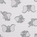 Printed muslin swaddles featuring various Dumbo designs in gray tones on a white background.