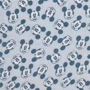Printed muslin swaddles featuring various Mickey Mouse expressions in navy blue on a light blue background.