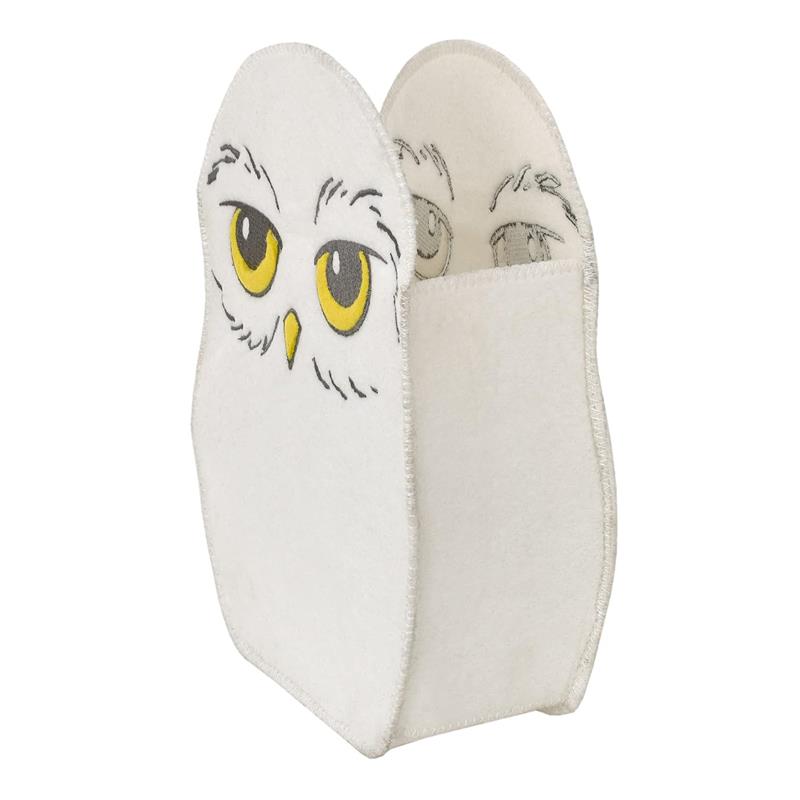 Felt storage bin designed as Hedwig, featuring large yellow eyes and a white owl design. Ideal for organizing items.