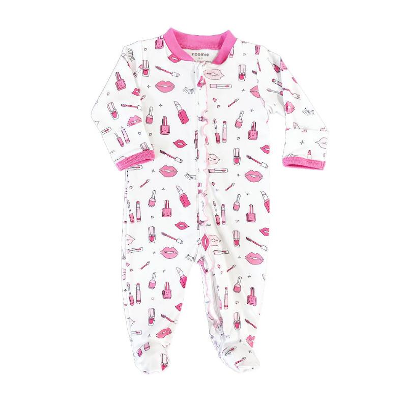 Baby girl zipper footie featuring a pink lip and makeup print, with a pink trim around the collar and cuffs.