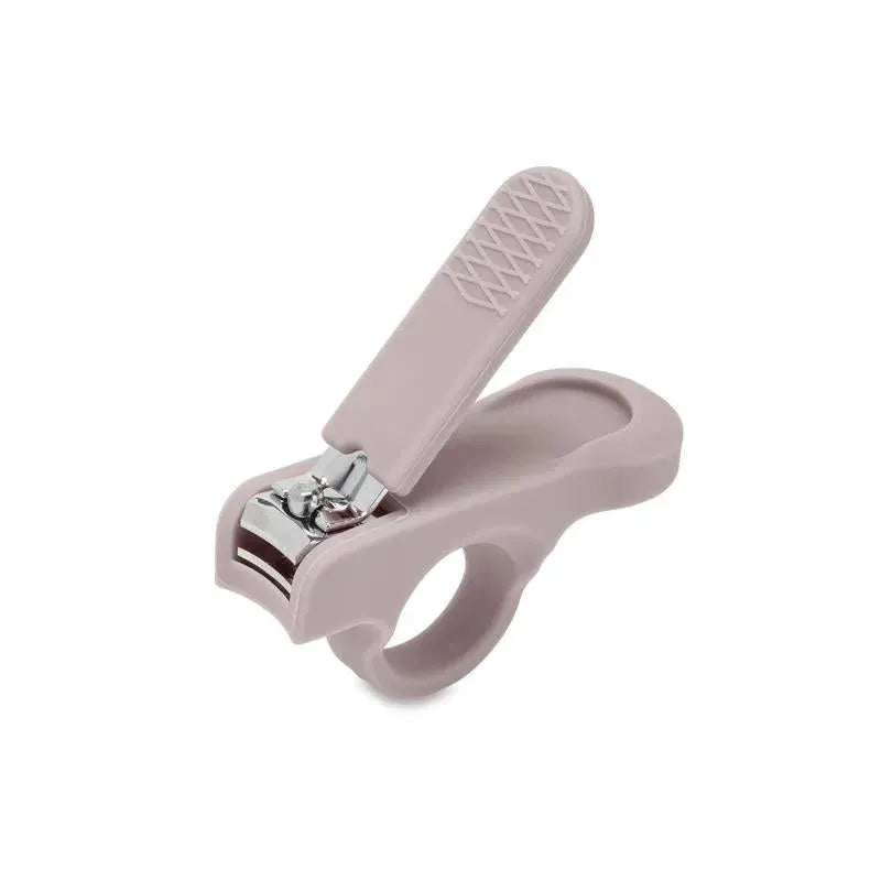 Baby nail clipper in soft blush color, designed with a rounded handle for easy grip and safety.