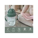 Non-spill weighted straw cup by Nouka, 9 oz, in soft sand color, featuring handles and visible product details below.