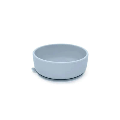Suction bowl in Lily Blue, designed to securely hold food or snacks for children, featuring a smooth, rounded design.